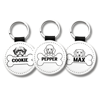 Personalized dog name keychains featuring custom pet names Cookie Pepper and Max with breed illustrations on round white keychains
