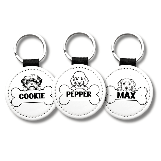 Personalized dog name keychains featuring custom pet names Cookie Pepper and Max with breed illustrations on round white keychains