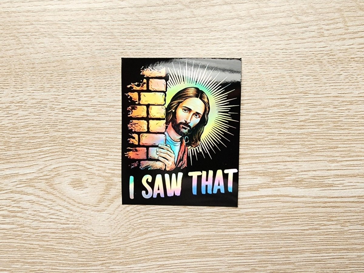 Funny holographic Jesus “I Saw That” sticker. Waterproof vinyl meme decal perfect for laptops, water bottles, cars, and gifts.