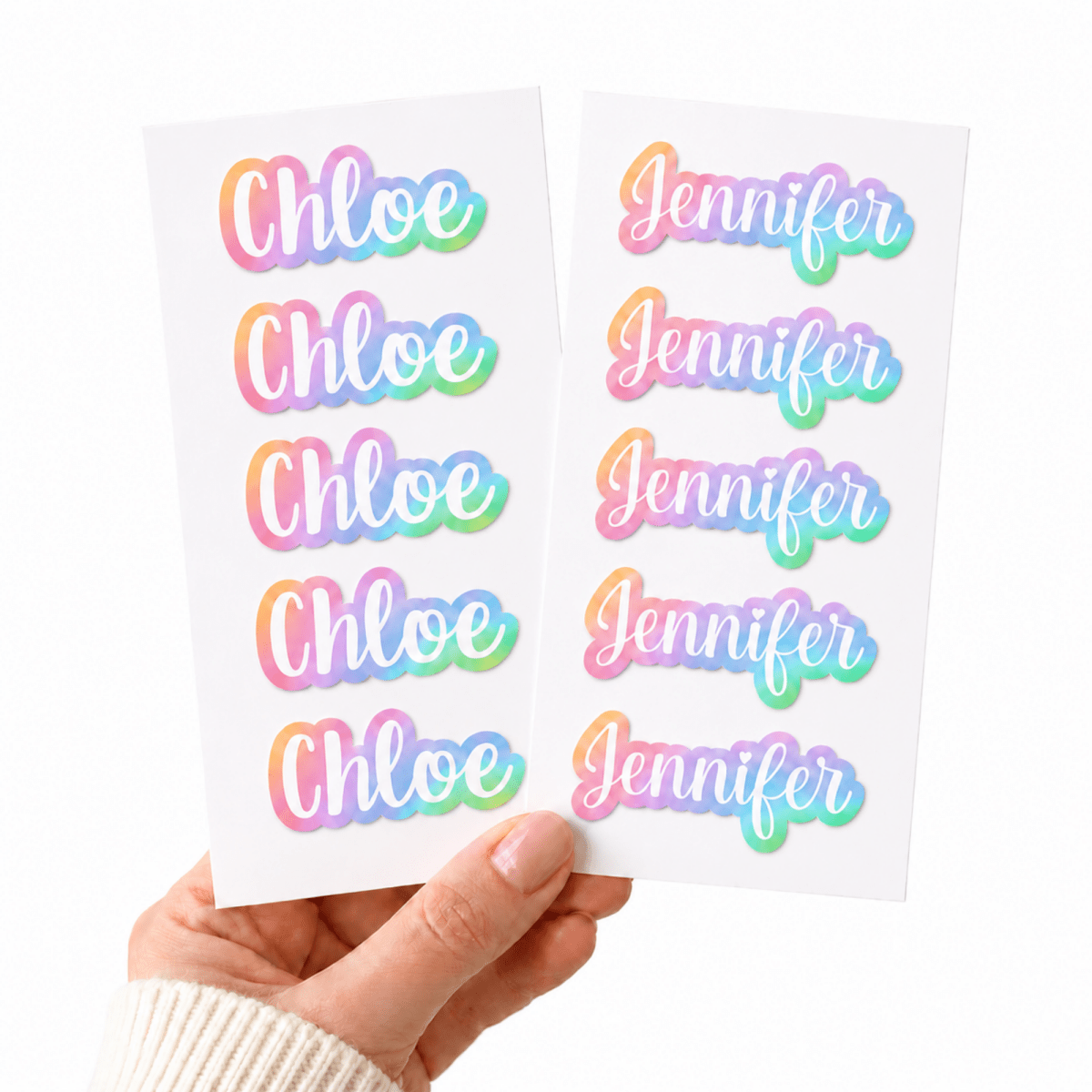 custom name sticker sheets with pastel rainbow gradient names, five personalized stickers per sheet.